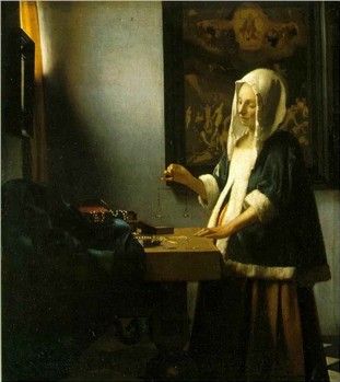 La femme portant une balance - Johannes Vermeer (1665) La femme portant une balance - Johannes Vermeer (1665)